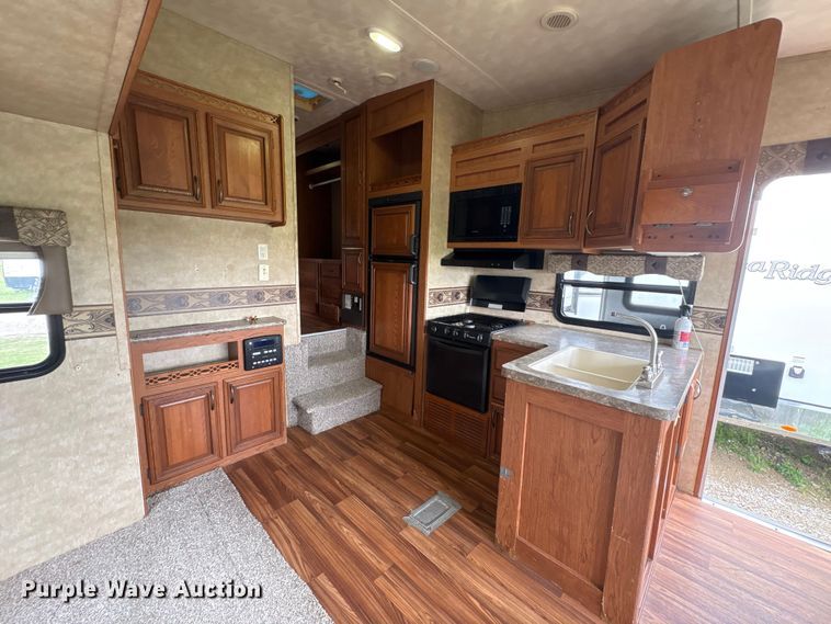 image for item EA7209 2014 Sabre Forest River 250RLUD camper