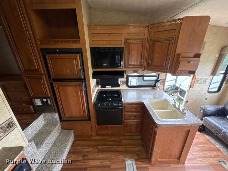 image for item EA7209 2014 Sabre Forest River 250RLUD camper