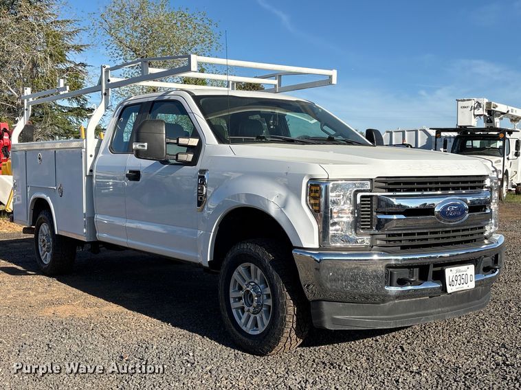 image for item EC8301 2019 Ford F250 Super Duty Ext. Cab utility bed pickup truck
