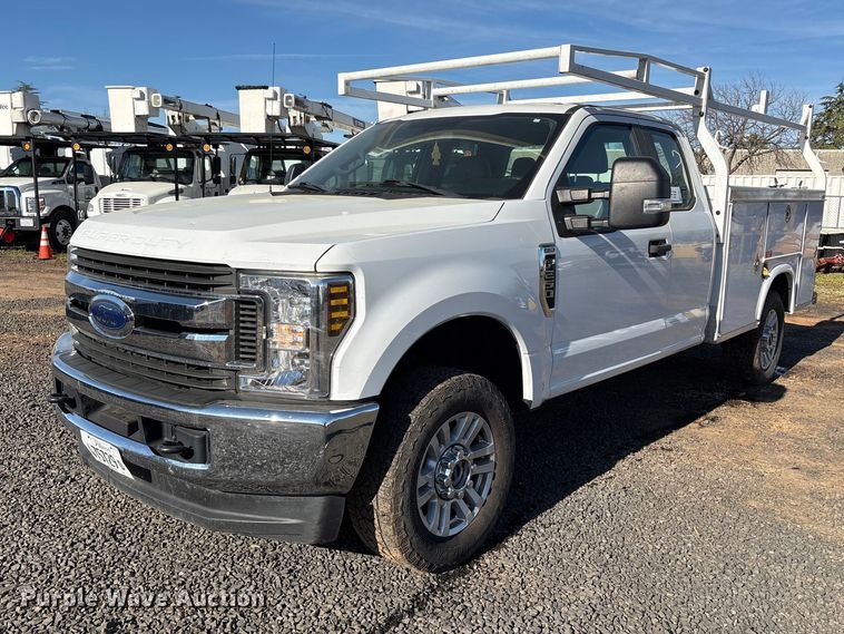 image for item EC8311 2019 Ford F250 Super Duty Ext. Cab utility bed pickup truck