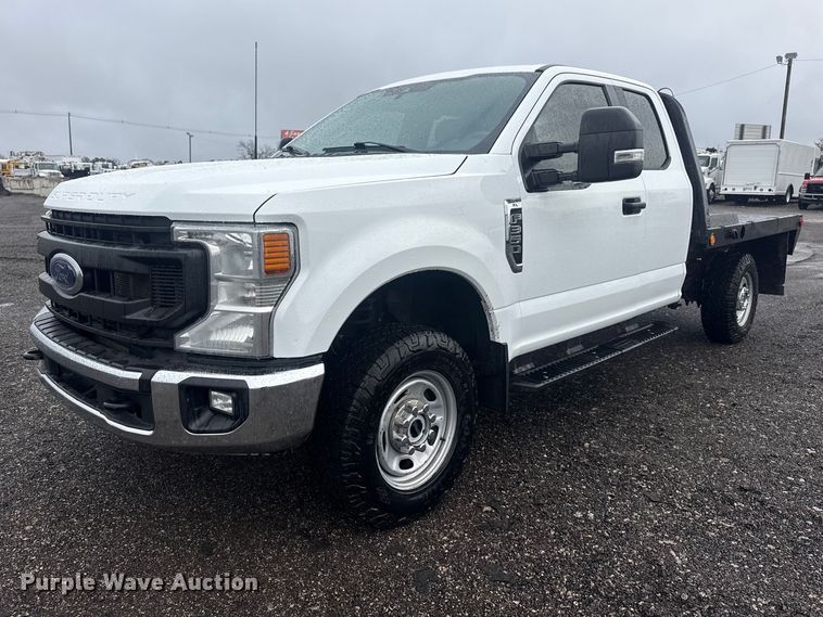 image for item EG2158 2022 Ford F350 Super Duty XL Ext. Cab flatbed pickup truck