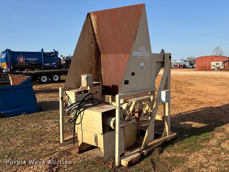 2001 J.V. Manufacturing, Inc. Cram-A-Lot QTT00140 cart tipper