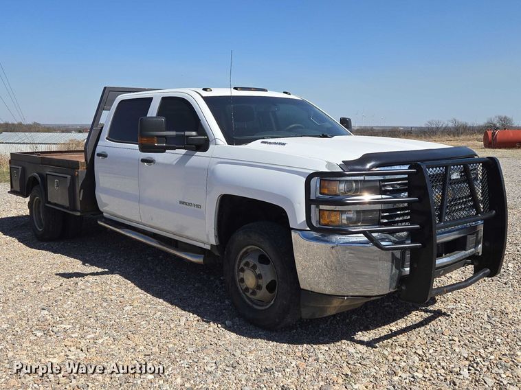 image for item ET1489 2016 Chevrolet Silverado 3500HD Crew Cab flatbed pickup truck