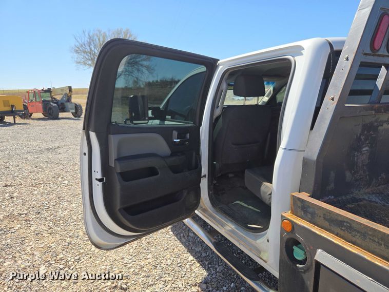 image for item ET1489 2016 Chevrolet Silverado 3500HD Crew Cab flatbed pickup truck