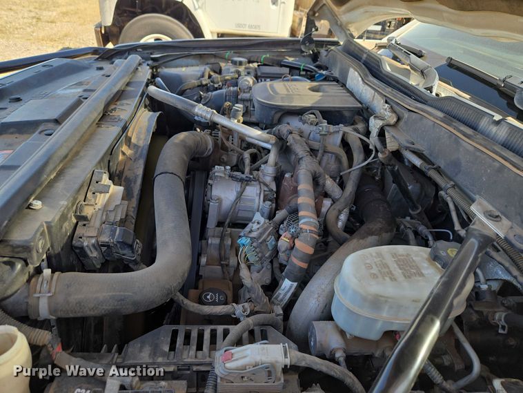 image for item ET1489 2016 Chevrolet Silverado 3500HD Crew Cab flatbed pickup truck