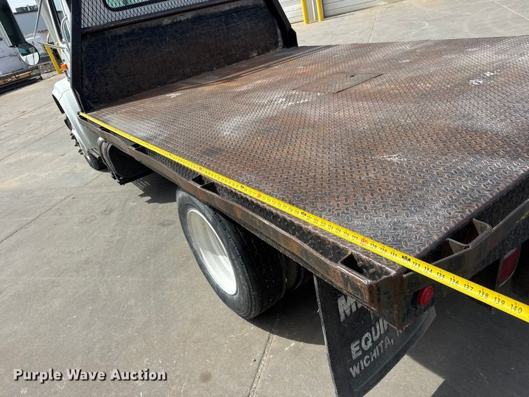 image for item ET1729 2000 International 4700  flatbed truck