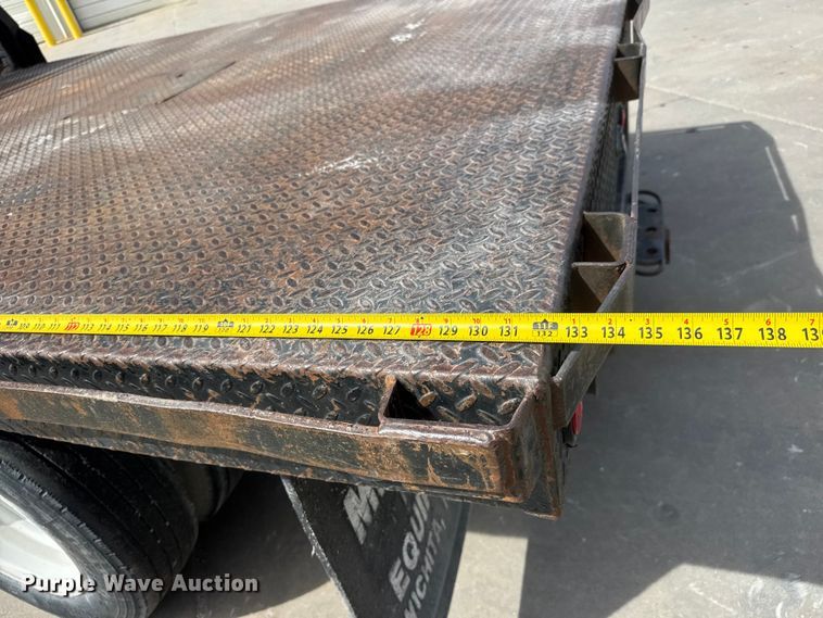 image for item ET1729 2000 International 4700  flatbed truck