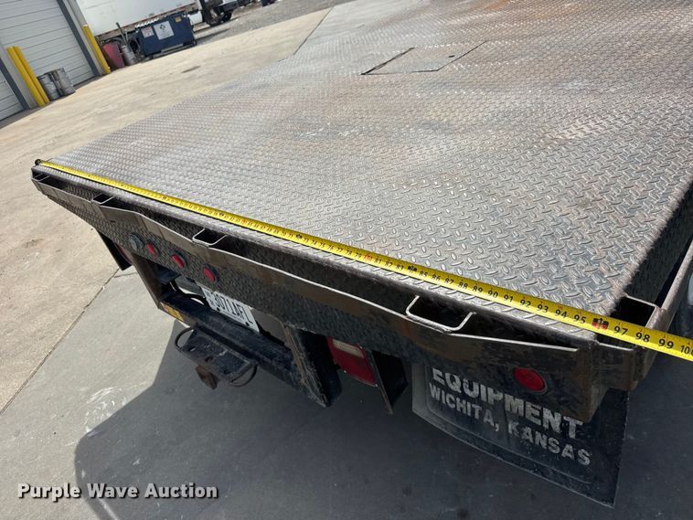image for item ET1729 2000 International 4700  flatbed truck