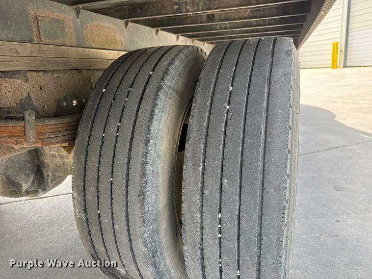 image for item ET1729 2000 International 4700  flatbed truck