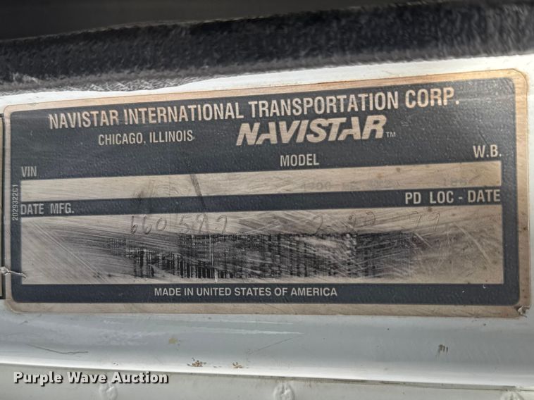 image for item ET1729 2000 International 4700  flatbed truck