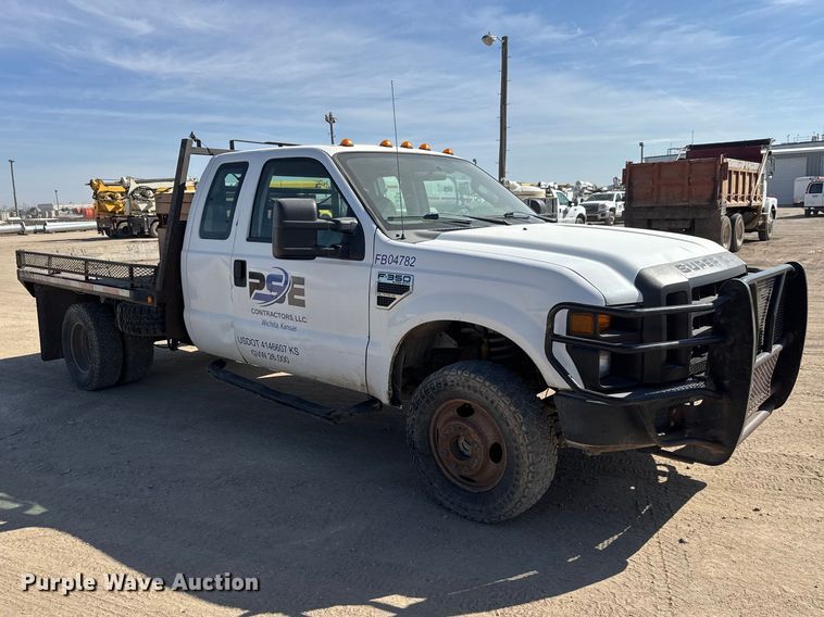 image for item ET1810 2010 Ford F350 Super Duty XL flatbed pickup truck