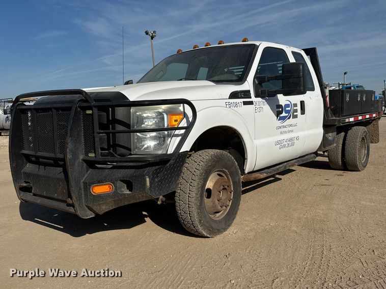 image for item ET1814 2011 Ford F350 Super Duty Ext. Cab flatbed pickup truck