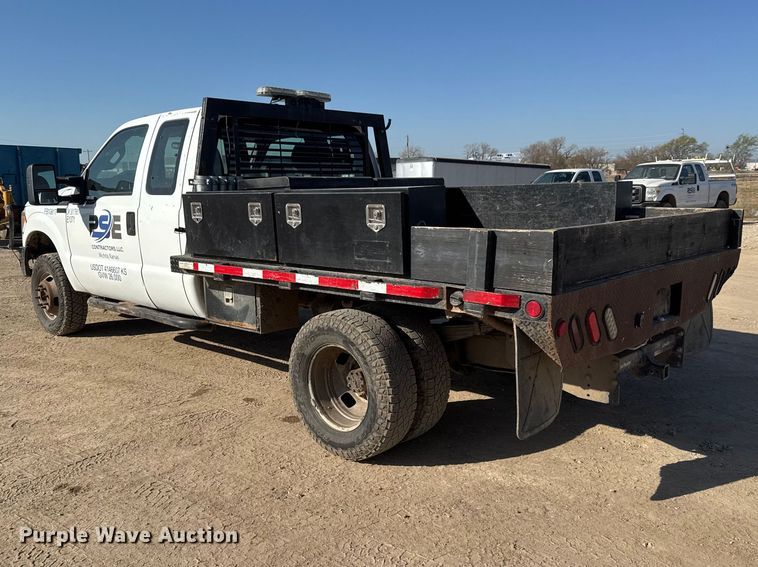 image for item ET1814 2011 Ford F350 Super Duty Ext. Cab flatbed pickup truck