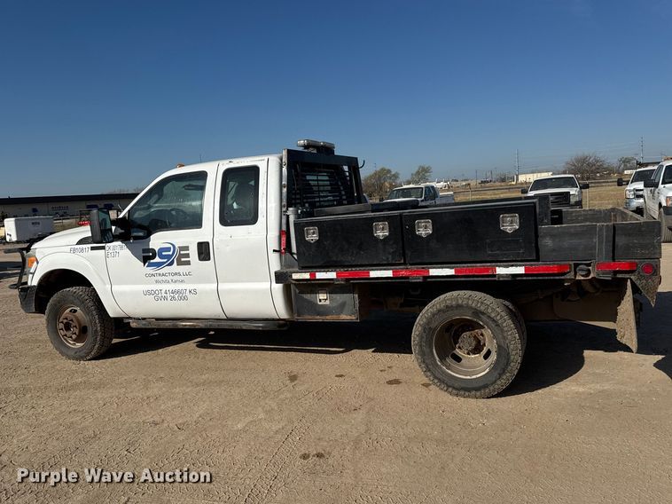 image for item ET1814 2011 Ford F350 Super Duty Ext. Cab flatbed pickup truck