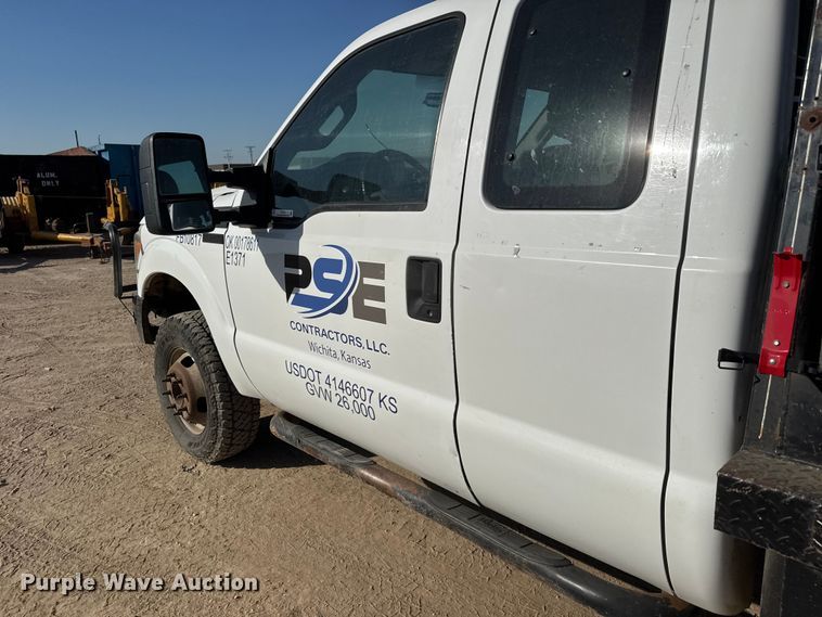 image for item ET1814 2011 Ford F350 Super Duty Ext. Cab flatbed pickup truck