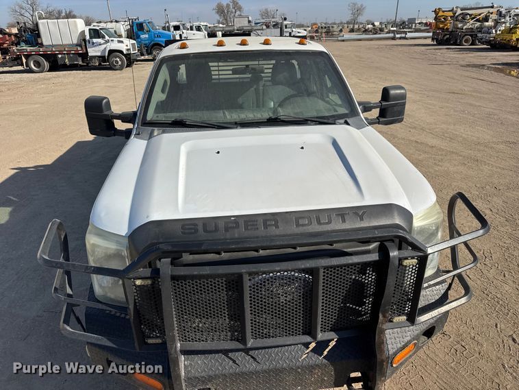 image for item ET1814 2011 Ford F350 Super Duty Ext. Cab flatbed pickup truck