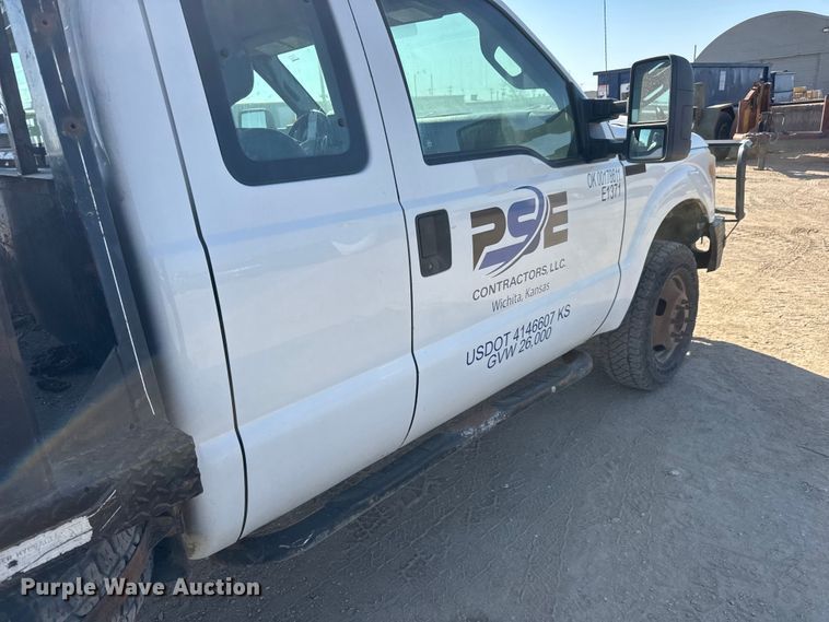 image for item ET1814 2011 Ford F350 Super Duty Ext. Cab flatbed pickup truck