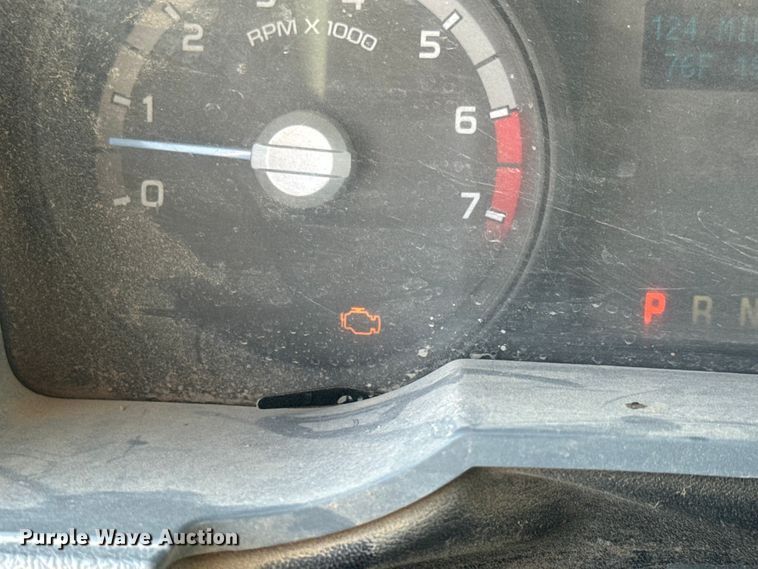 image for item ET1814 2011 Ford F350 Super Duty Ext. Cab flatbed pickup truck