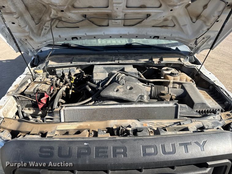 image for item ET1814 2011 Ford F350 Super Duty Ext. Cab flatbed pickup truck