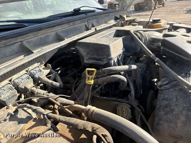 image for item ET1814 2011 Ford F350 Super Duty Ext. Cab flatbed pickup truck