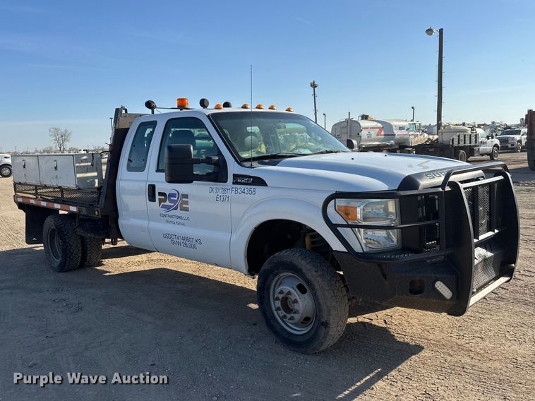 image for item ET1818 2012 Ford F350 Super Duty XL Ext. Cab flatbed pickup truck