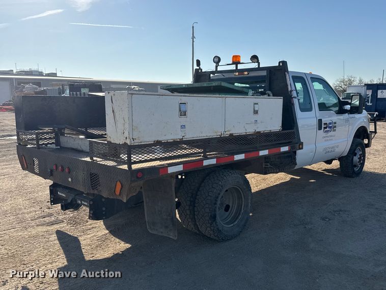 image for item ET1818 2012 Ford F350 Super Duty XL Ext. Cab flatbed pickup truck