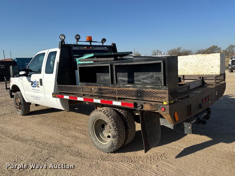 image for item ET1818 2012 Ford F350 Super Duty XL Ext. Cab flatbed pickup truck