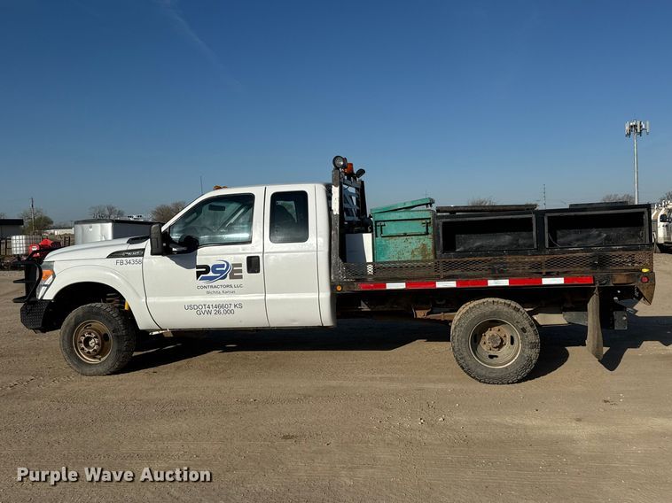 image for item ET1818 2012 Ford F350 Super Duty XL Ext. Cab flatbed pickup truck