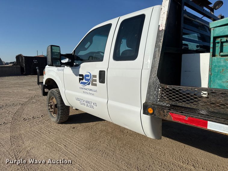 image for item ET1818 2012 Ford F350 Super Duty XL Ext. Cab flatbed pickup truck