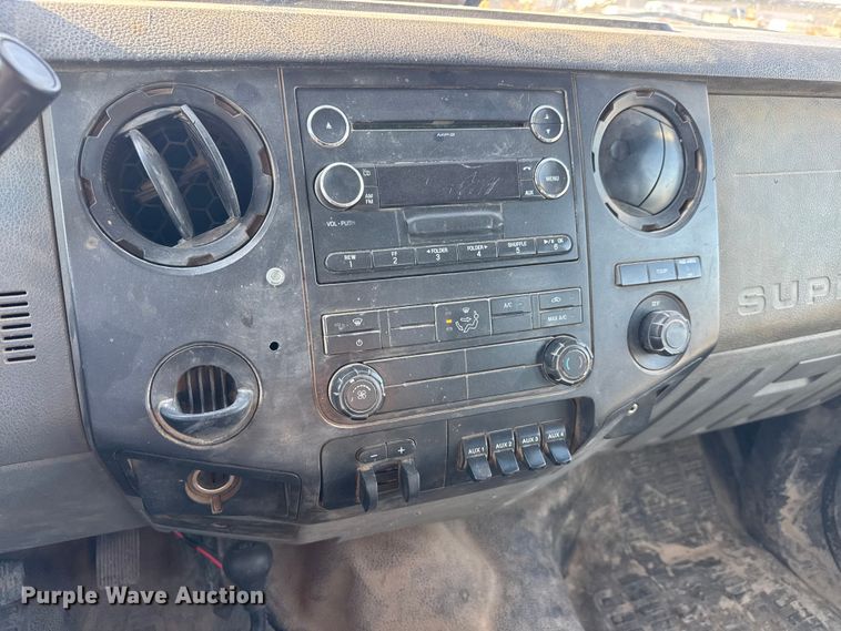 image for item ET1818 2012 Ford F350 Super Duty XL Ext. Cab flatbed pickup truck