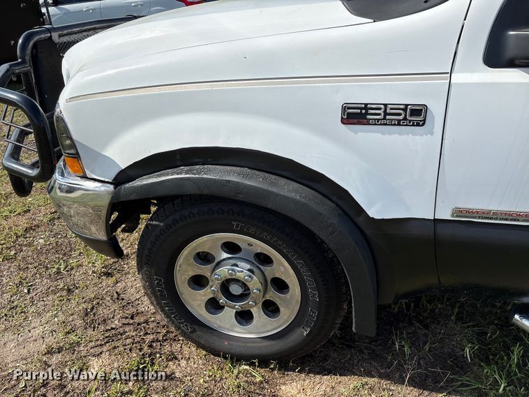image for item EU7419 2004 Ford F350 Super Duty Crew Cab flatbed pickup truck