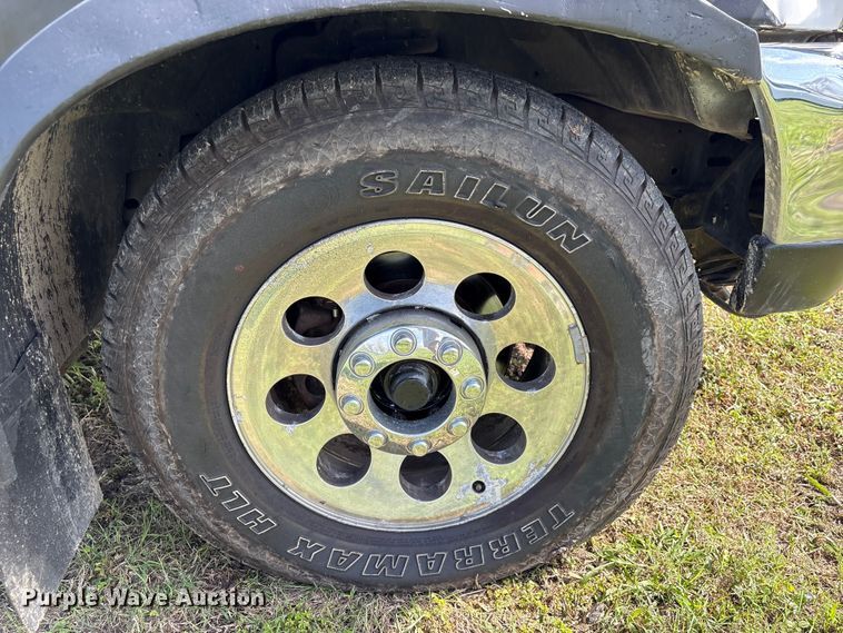 image for item EU7419 2004 Ford F350 Super Duty Crew Cab flatbed pickup truck