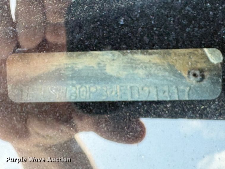 image for item EU7419 2004 Ford F350 Super Duty Crew Cab flatbed pickup truck