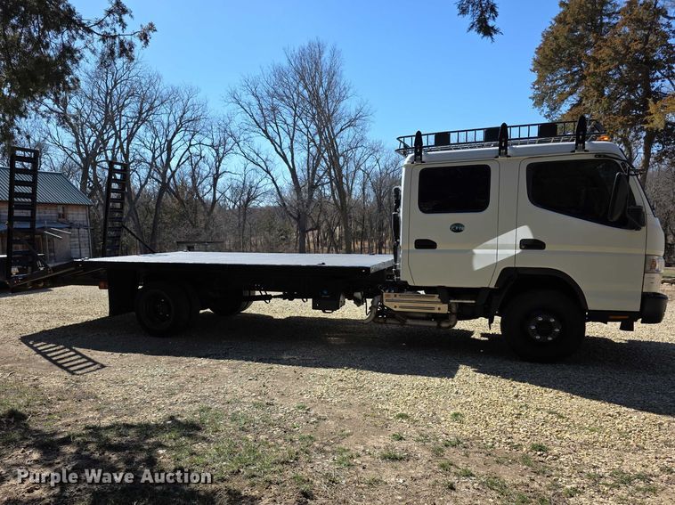 image for item FI0878 2012 Mitsubishi Fuso FE160 Crew Cab flatbed truck