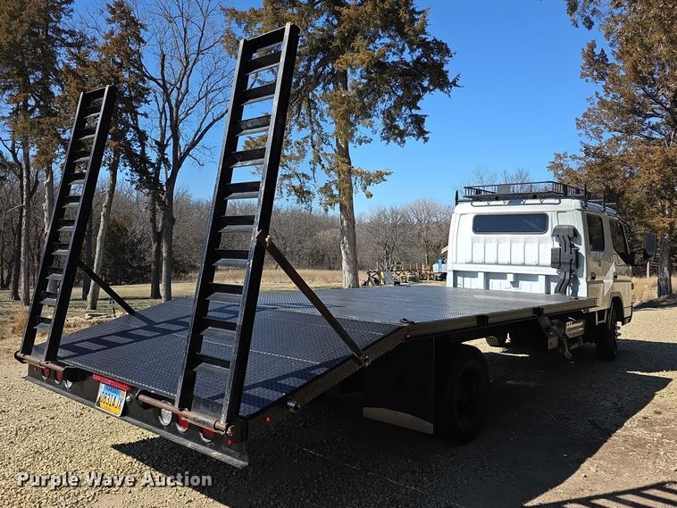 image for item FI0878 2012 Mitsubishi Fuso FE160 Crew Cab flatbed truck
