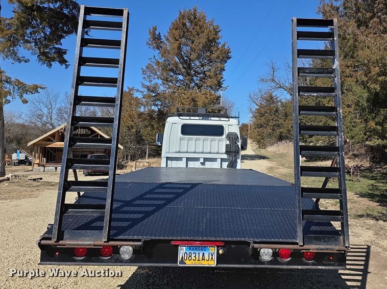 image for item FI0878 2012 Mitsubishi Fuso FE160 Crew Cab flatbed truck