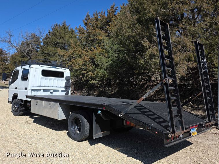 image for item FI0878 2012 Mitsubishi Fuso FE160 Crew Cab flatbed truck