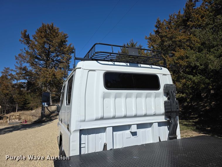 image for item FI0878 2012 Mitsubishi Fuso FE160 Crew Cab flatbed truck