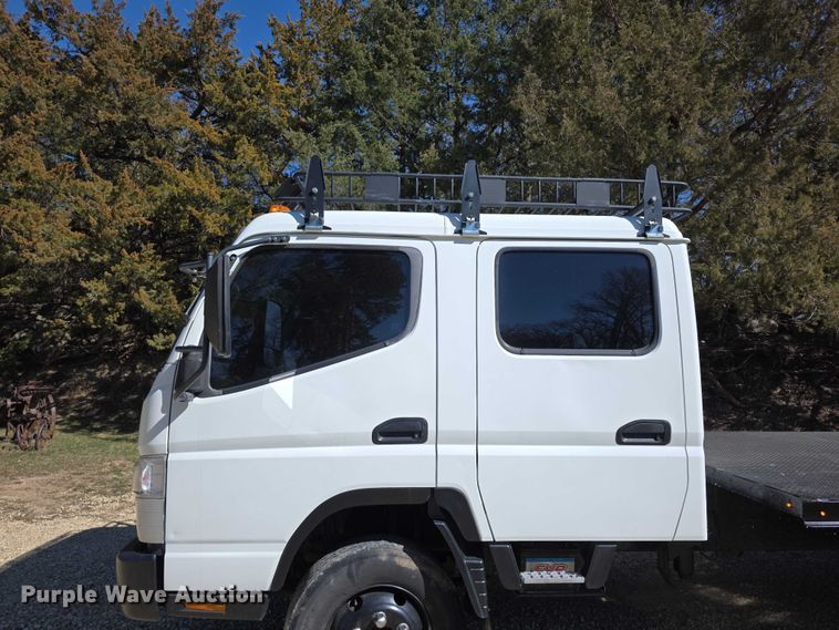 image for item FI0878 2012 Mitsubishi Fuso FE160 Crew Cab flatbed truck