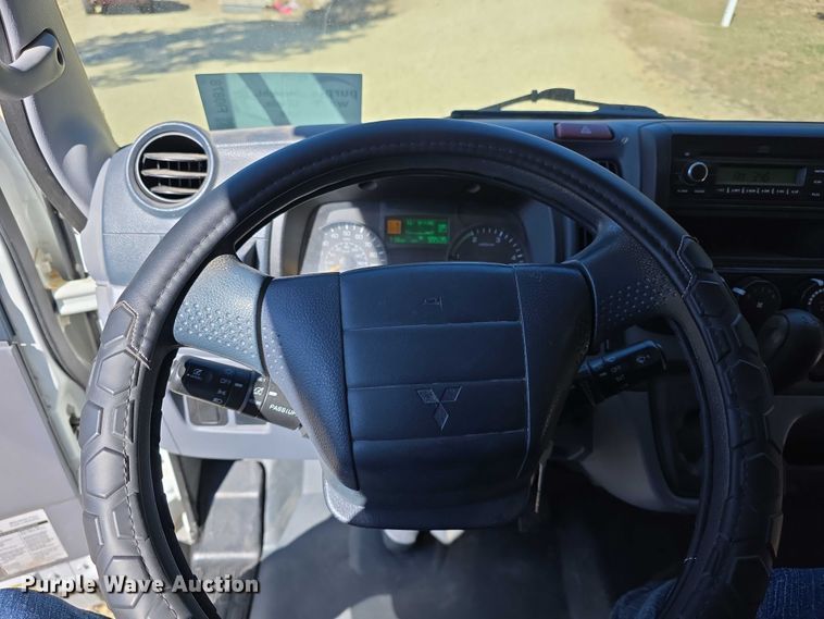 image for item FI0878 2012 Mitsubishi Fuso FE160 Crew Cab flatbed truck