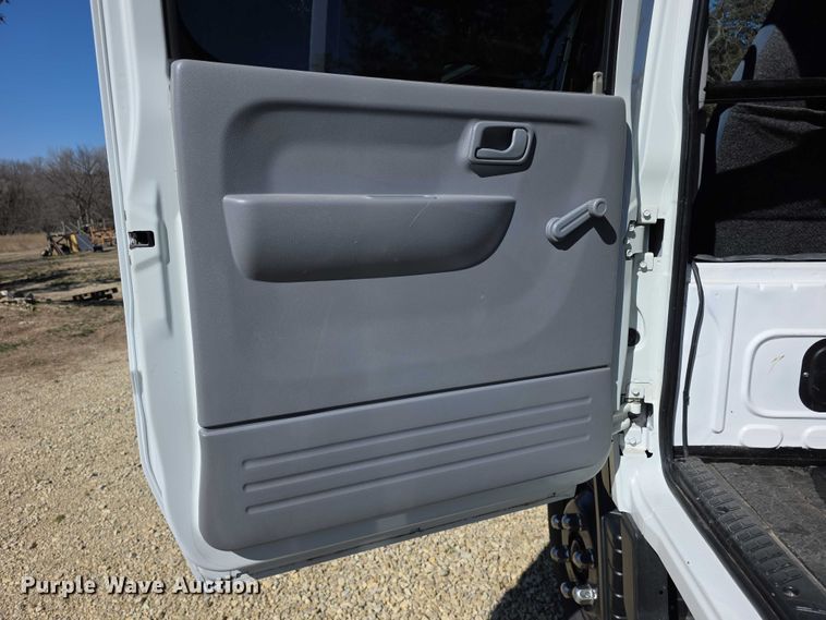 image for item FI0878 2012 Mitsubishi Fuso FE160 Crew Cab flatbed truck