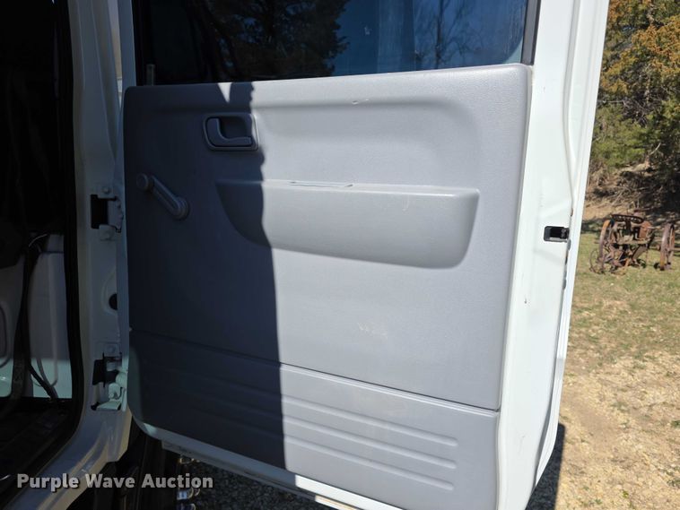 image for item FI0878 2012 Mitsubishi Fuso FE160 Crew Cab flatbed truck