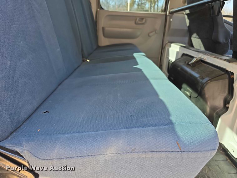 image for item FI0878 2012 Mitsubishi Fuso FE160 Crew Cab flatbed truck