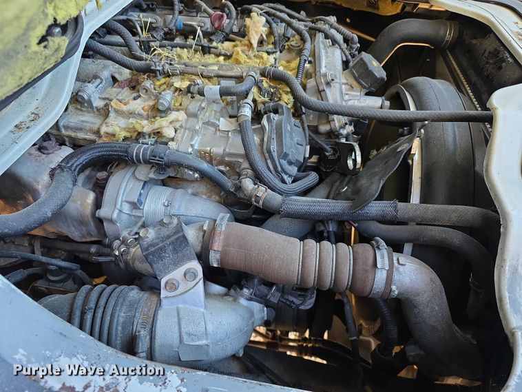 image for item FI0878 2012 Mitsubishi Fuso FE160 Crew Cab flatbed truck