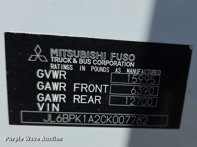 image for item FI0878 2012 Mitsubishi Fuso FE160 Crew Cab flatbed truck