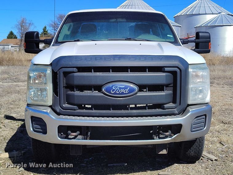 image for item IH9475 2014 Ford F250 Super Duty Ext. Cab utility bed pickup truck