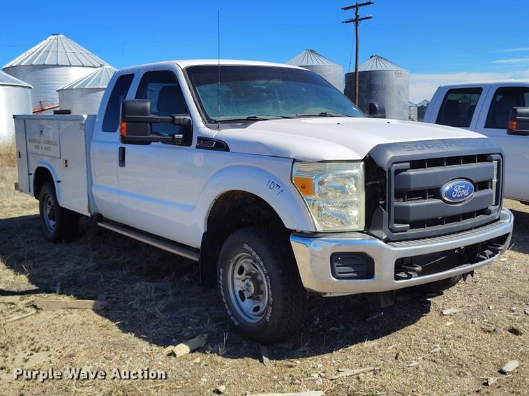 image for item IH9475 2014 Ford F250 Super Duty Ext. Cab utility bed pickup truck