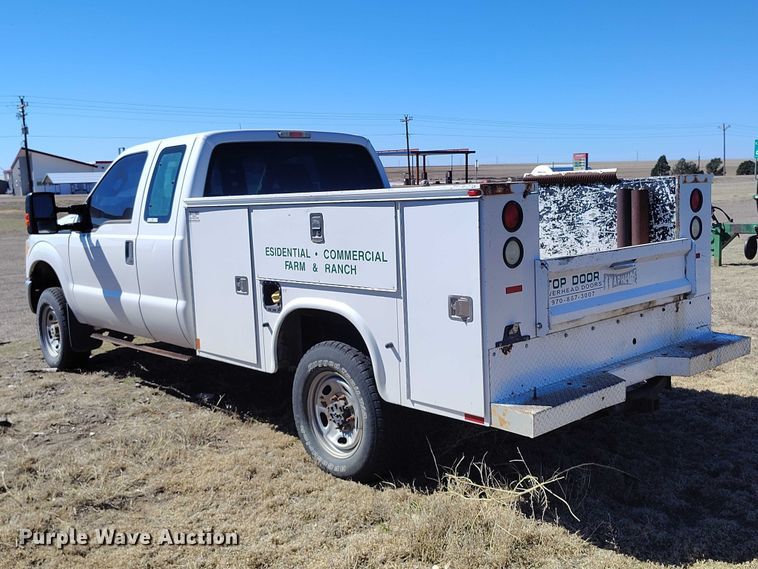 image for item IH9475 2014 Ford F250 Super Duty Ext. Cab utility bed pickup truck