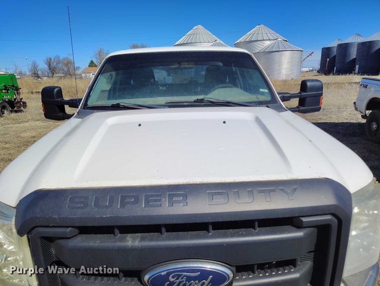 image for item IH9475 2014 Ford F250 Super Duty Ext. Cab utility bed pickup truck