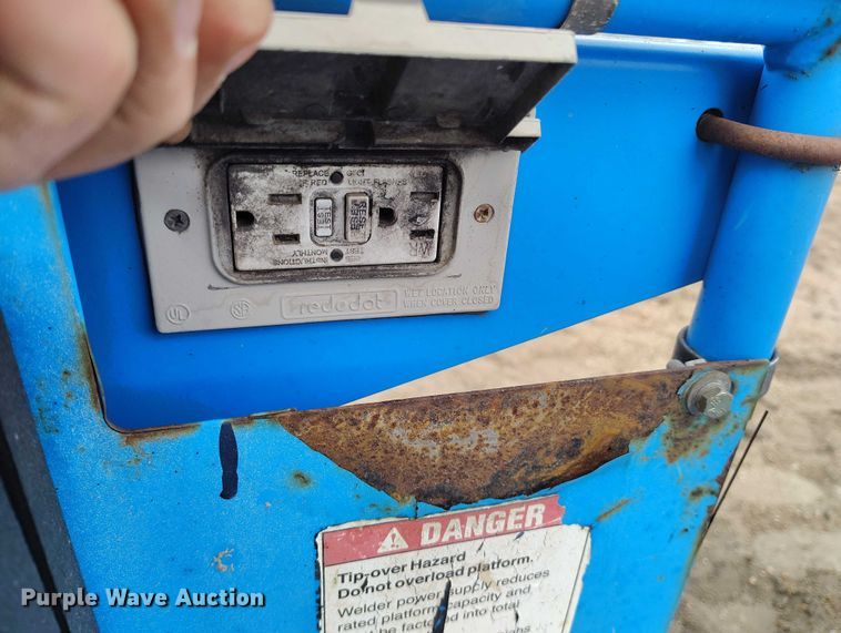 image for item EC8973 2006 Genie Z-135 boom lift